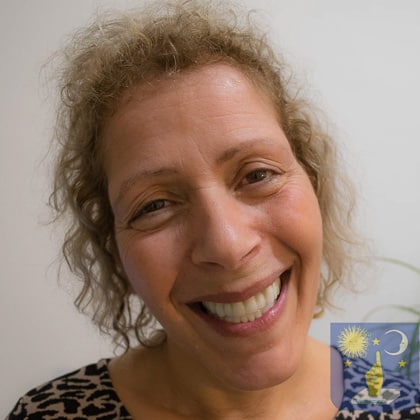 patient with periodontitis smiling after full dental restoration with basal implants